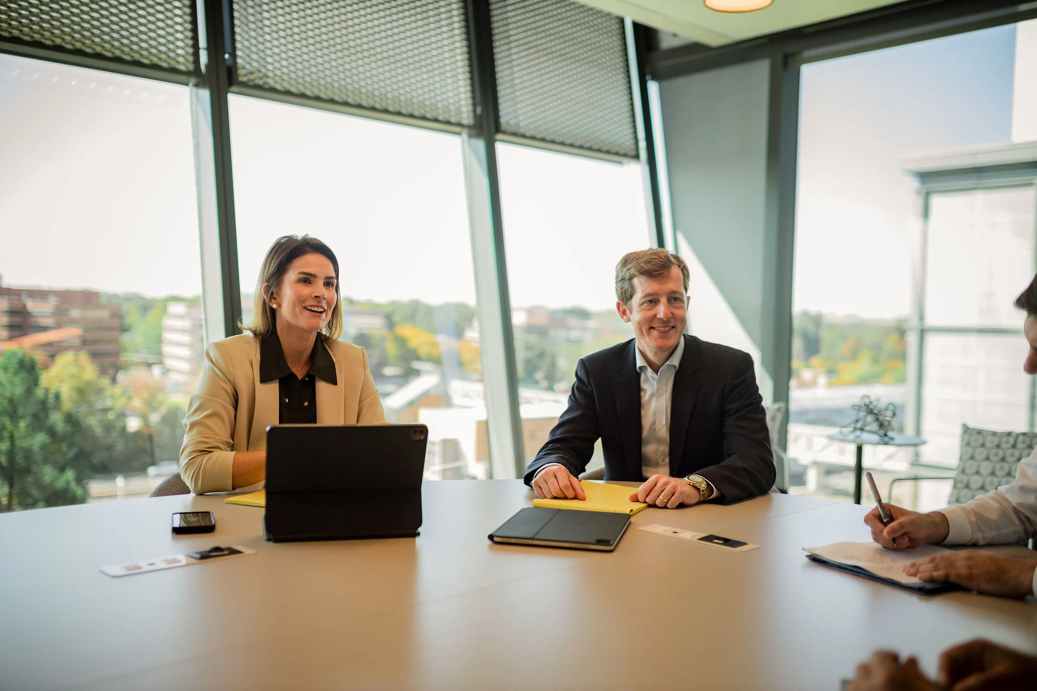 Mike Daugherty and Kim Luckey trial lawyers in a meeting in northern VA